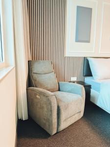 A seating area at F Hotel 24h Check-In