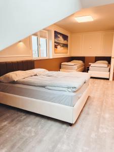 A bed or beds in a room at F Hotel 24h Check-In