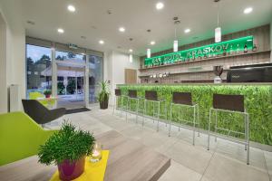 Posezení v ubytování Hotel Kraskov Active Resort