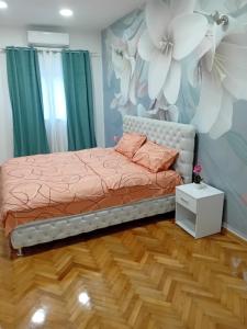 Postel nebo postele na pokoji v ubytování Venera Lux Apartman