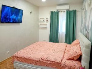 Postel nebo postele na pokoji v ubytování Venera Lux Apartman