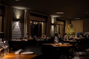 Restoran või mõni muu söögikoht majutusasutuses Hotel Rasinus