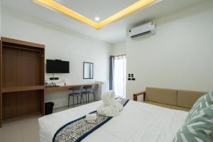 T-OneHome客房内的一张或多张床位