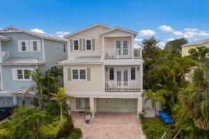 an aerial view of a house with a garage at Margarita-Ville in Holmes Beach