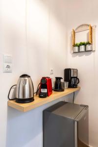 Η κουζίνα ή μικρή κουζίνα στο Elena's Cozy & Central Nest