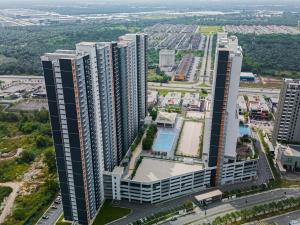 an aerial view of a city with tall buildings at YNWA Shankly Stay, Near KLIA in Sepang