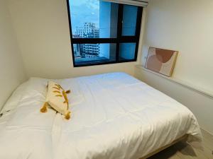 Een bed of bedden in een kamer bij 礁溪 Hao Hao