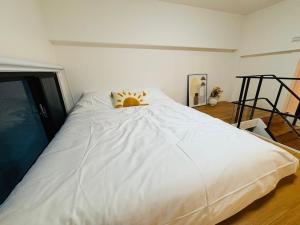 Een bed of bedden in een kamer bij 礁溪 Hao Hao