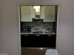 A kitchen or kitchenette at Dimora 14