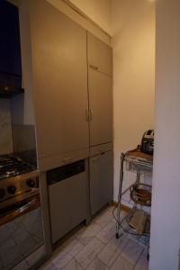A kitchen or kitchenette at Lovely & Quite One Bedroom Near Piazza Santo Spirito