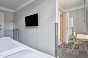 A television and/or entertainment centre at Four Points Flex by Sheraton Copenhagen City