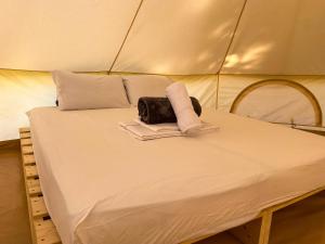 Lodg'ing Nature Camp Anjou客房内的一张或多张床位