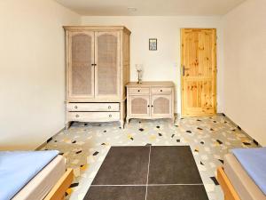 Posteľ alebo postele v izbe v ubytovaní Apartmány Klatovská