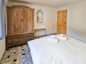 Posteľ alebo postele v izbe v ubytovaní Apartmány Klatovská