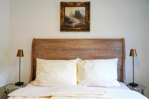 Posteľ alebo postele v izbe v ubytovaní Apartmány Klatovská