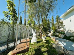 Сад в Space Villa Kan