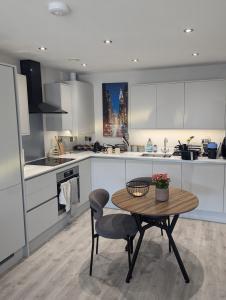 Kuchyň nebo kuchyňský kout v ubytování Stylish Harbourside Apartment + 5 fotografií