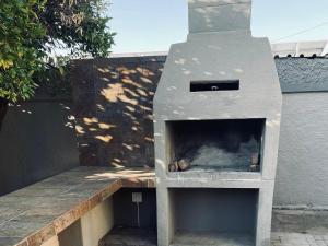 Kemudahan BBQ tersedia untuk tetamu di rumah tamu ini