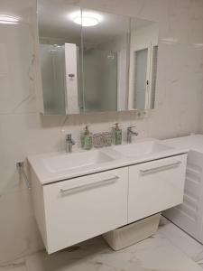 Kúpeľňa v ubytovaní Luxus Apartment KFJ