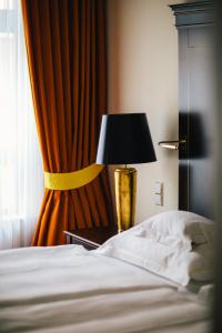 Postel nebo postele na pokoji v ubytování Relais & Châteaux Bülow Palais