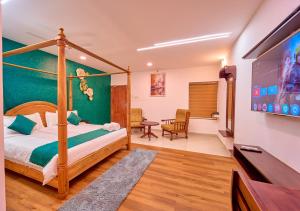 Postel nebo postele na pokoji v ubytování VOYE HOMES Signature Pool Resort Varkala , Just 950 m from Varkala Cliff and Beach