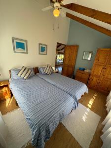 Ένα ή περισσότερα κρεβάτια σε δωμάτιο στο Birdsnest Guest Accommodation