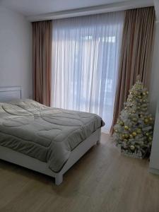 Postel nebo postele na pokoji v ubytování Bakuriani 4rest , X2 Development