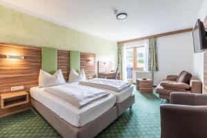 Letto o letti in una camera di Hotel Post by keyone