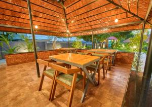 Fotografie z fotogalerie ubytování VOYE HOMES Signature Pool Resort Varkala , Just 950 m from Varkala Cliff and Beach v destinaci Varkala