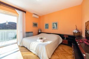 Postel nebo postele na pokoji v ubytování Apartment Stipe