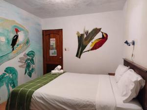 Voodi või voodid majutusasutuse Biohostal Mindo Cloud Forest toas