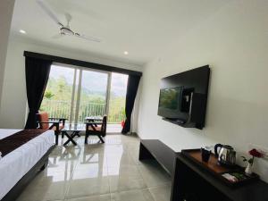 Et tv og/eller underholdning på Rainwood Aurum Resort