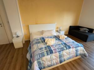 A bed or beds in a room at La Vecchia Stazione B&B