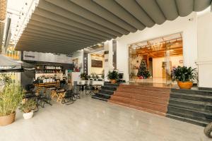 Restaurace v ubytování Lê Mùi Hotel - Apartment