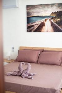 Postel nebo postele na pokoji v ubytování Brend new one bedroom Penthouse