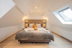 Postel nebo postele na pokoji v ubytování Guesthouse Elena