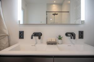 Koupelna v ubytování Guesthouse Elena