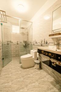 Koupelna v ubytování Lê Mùi Hotel - Apartment