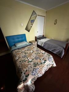 Ένα ή περισσότερα κρεβάτια σε δωμάτιο στο HABITACION DOBLE baño compartido +4 φωτογραφίες