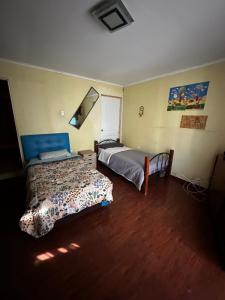 Ένα ή περισσότερα κρεβάτια σε δωμάτιο στο HABITACION DOBLE baño compartido