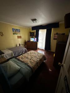 Ένα ή περισσότερα κρεβάτια σε δωμάτιο στο HABITACION DOBLE baño compartido