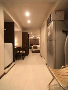 Kuchyň nebo kuchyňský kout v ubytování Le Tour Hotel Akihabara Ekimae 楽途ホテル秋葉原駅前店