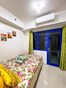 Sea Residences Sailor客房内的一张或多张床位
