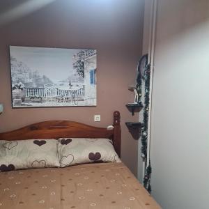Llit o llits en una habitació de Apartman EXKLUZIV
