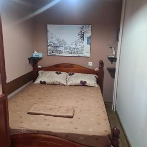 Llit o llits en una habitació de Apartman EXKLUZIV