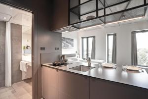 Kuchyň nebo kuchyňský kout v ubytování Four Points Flex by Sheraton Lyngby