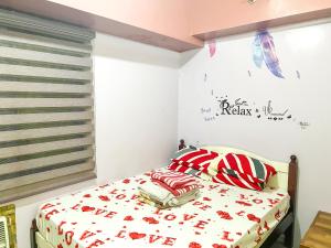 Sea Residences Sailor客房内的一张或多张床位