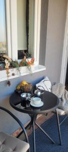 A seating area at Apartman Riva