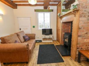 Et opholdsområde på Medlar Cottage