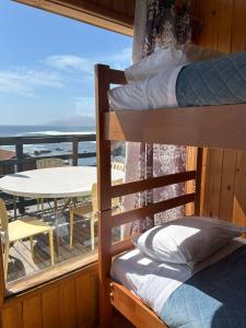 Ένα ή περισσότερα κρεβάτια σε δωμάτιο στο Cabaña Top +3 φωτογραφίες